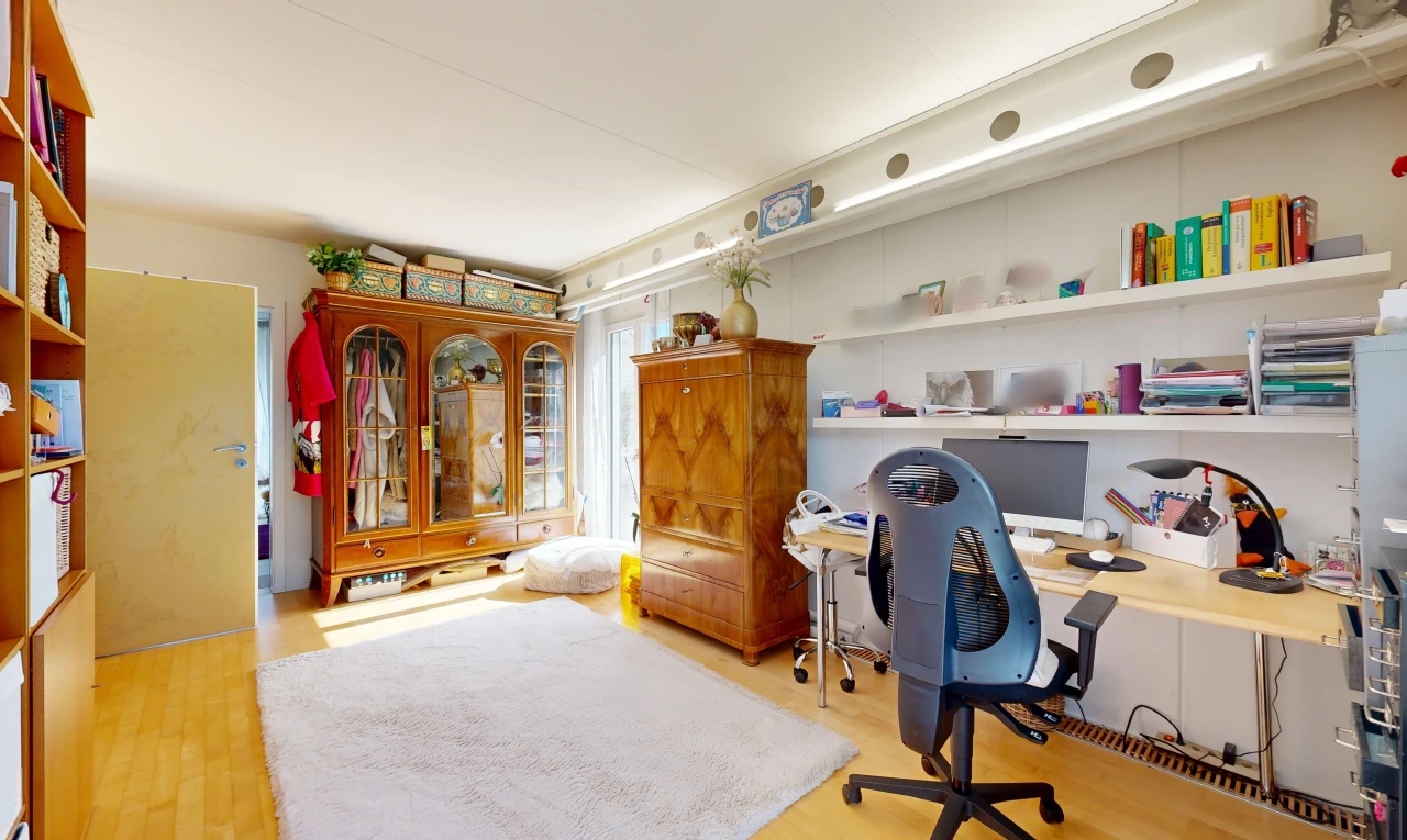 office with light wood-type flooring