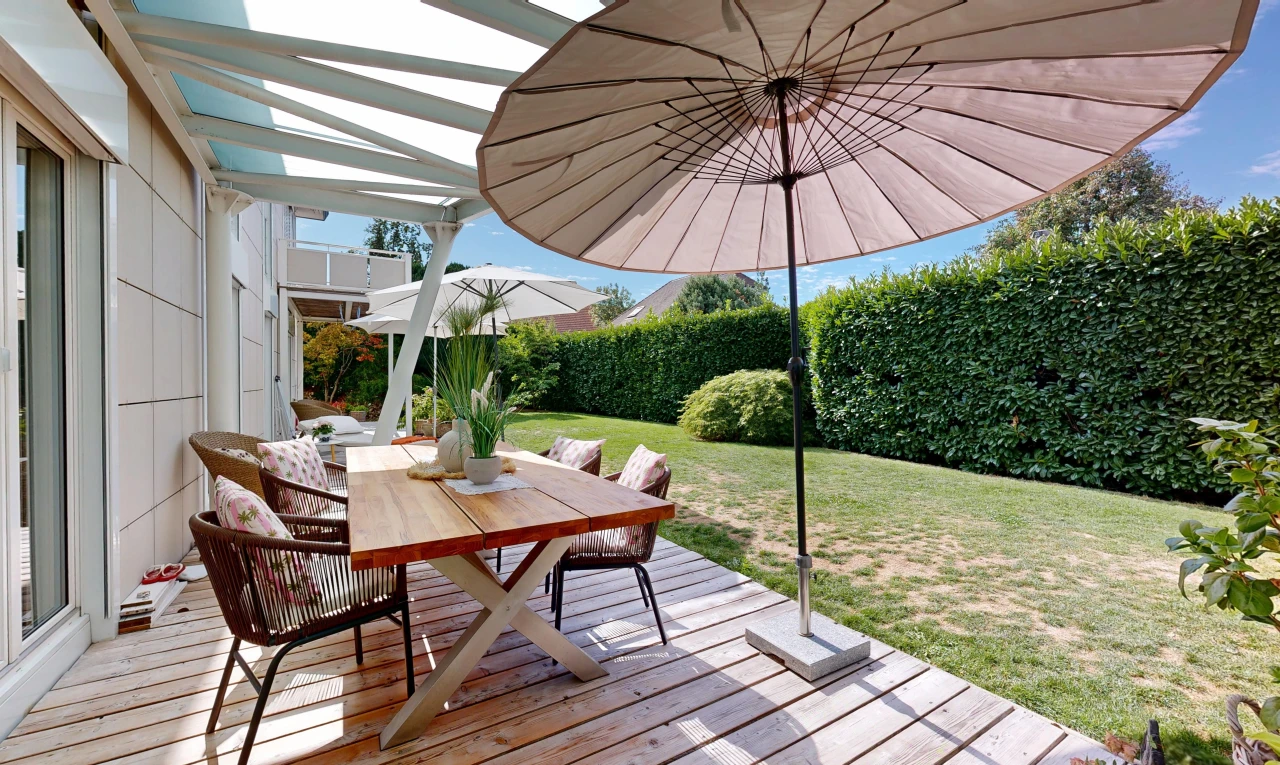 view of wooden terrace with outdoor dining space