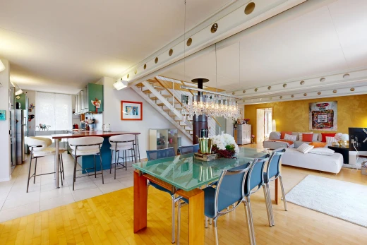 living area featuring stairs and light wood-type flooring