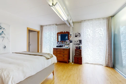 room / bedroom with light wood-style floors