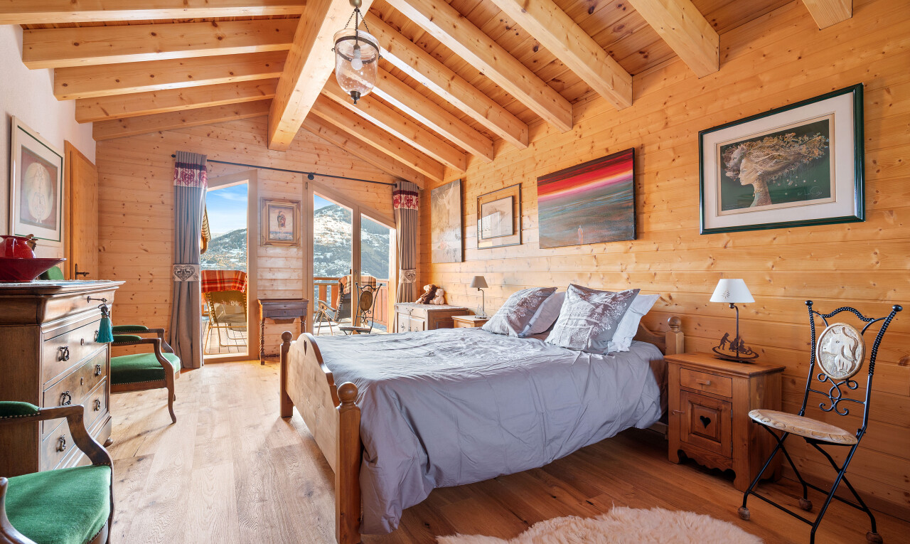 room / bedroom featuring wood walls, wood-type flooring, access to outside, and wood ceiling