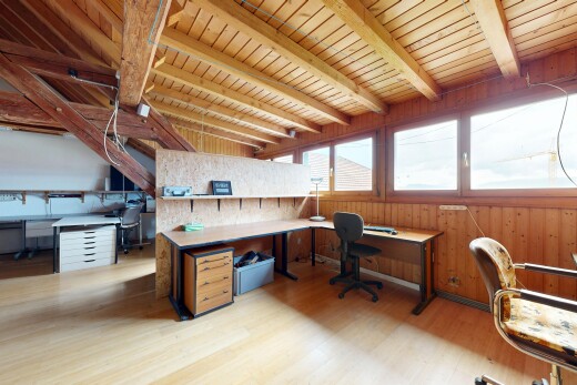 bureau avec espace bureau, natural light, lumière naturelle, inside property, et wood finish floor