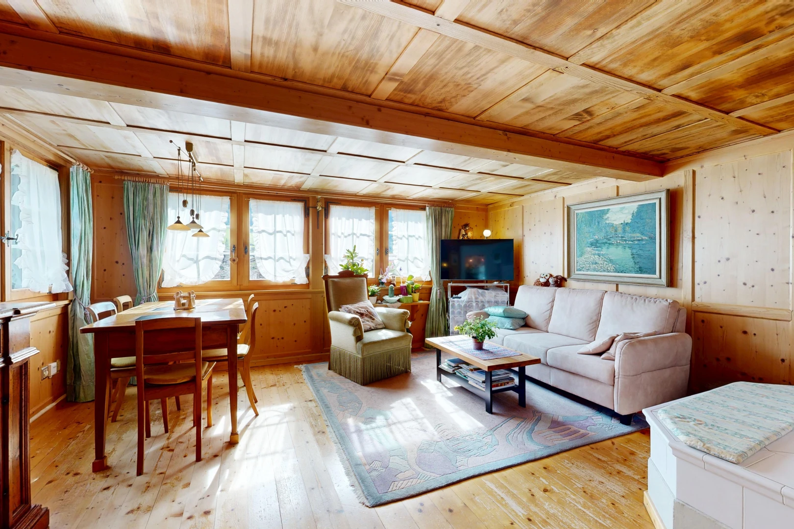 living area featuring a wood ceiling with exposed beams, light wood-style flooring, and wood walls