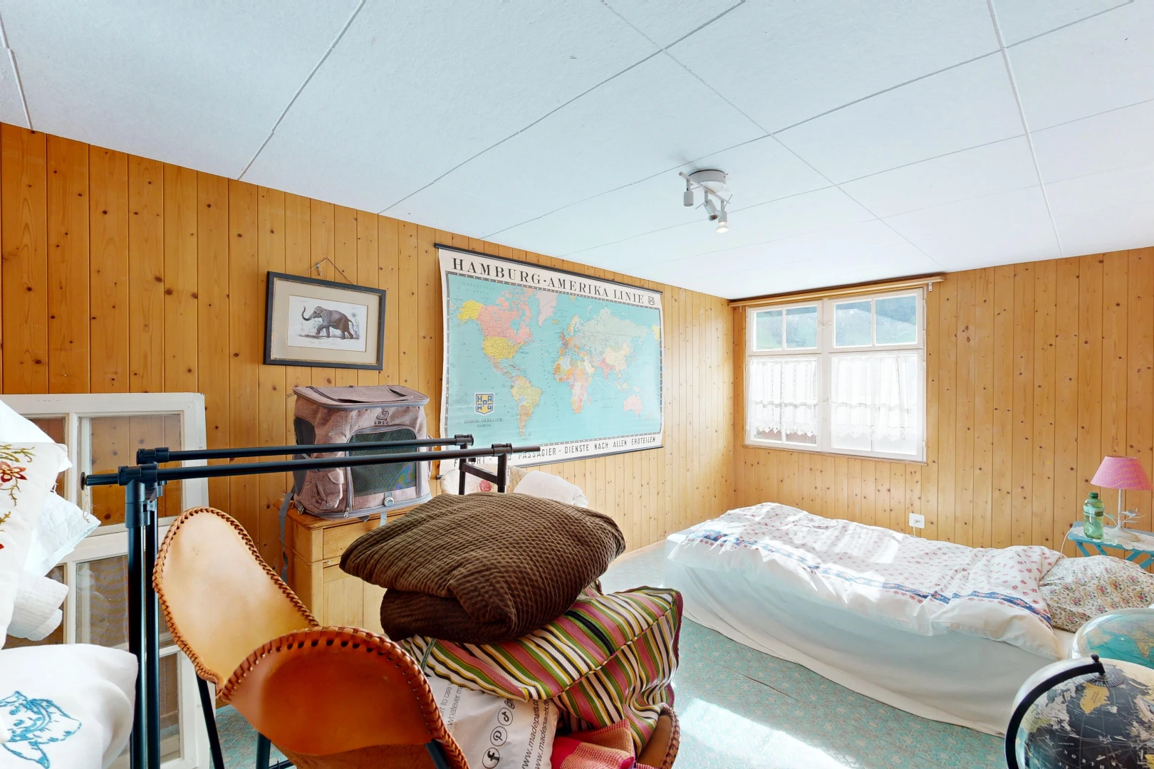 room / bedroom with wooden walls