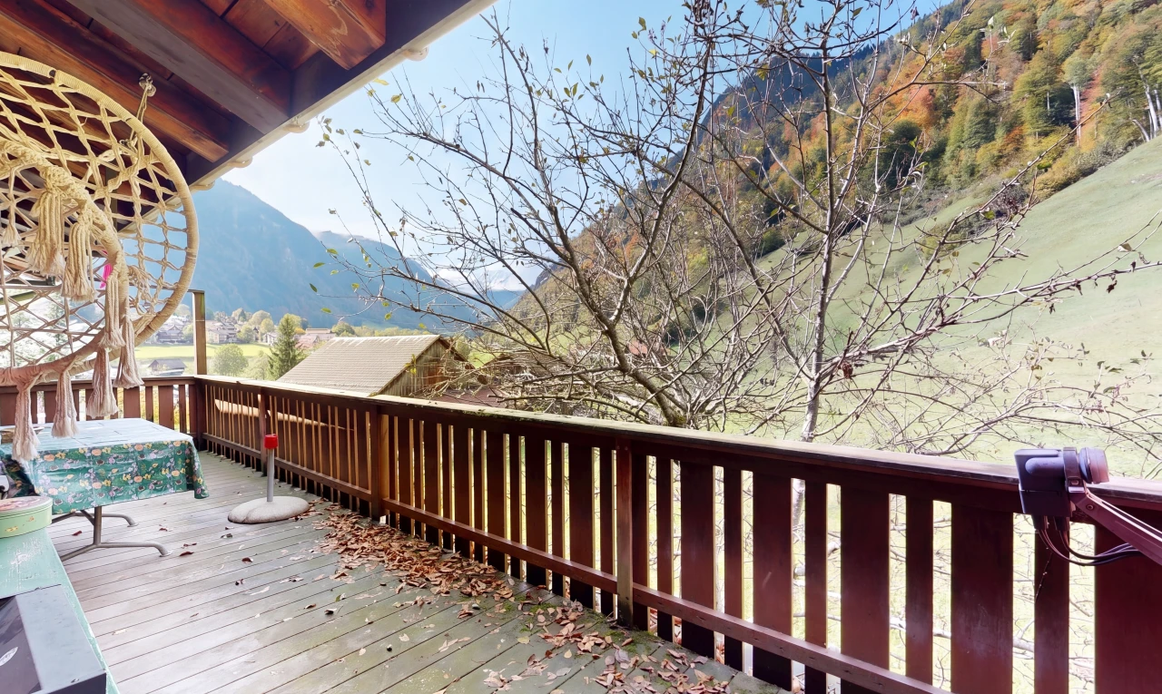 balcony with a deck with mountain view