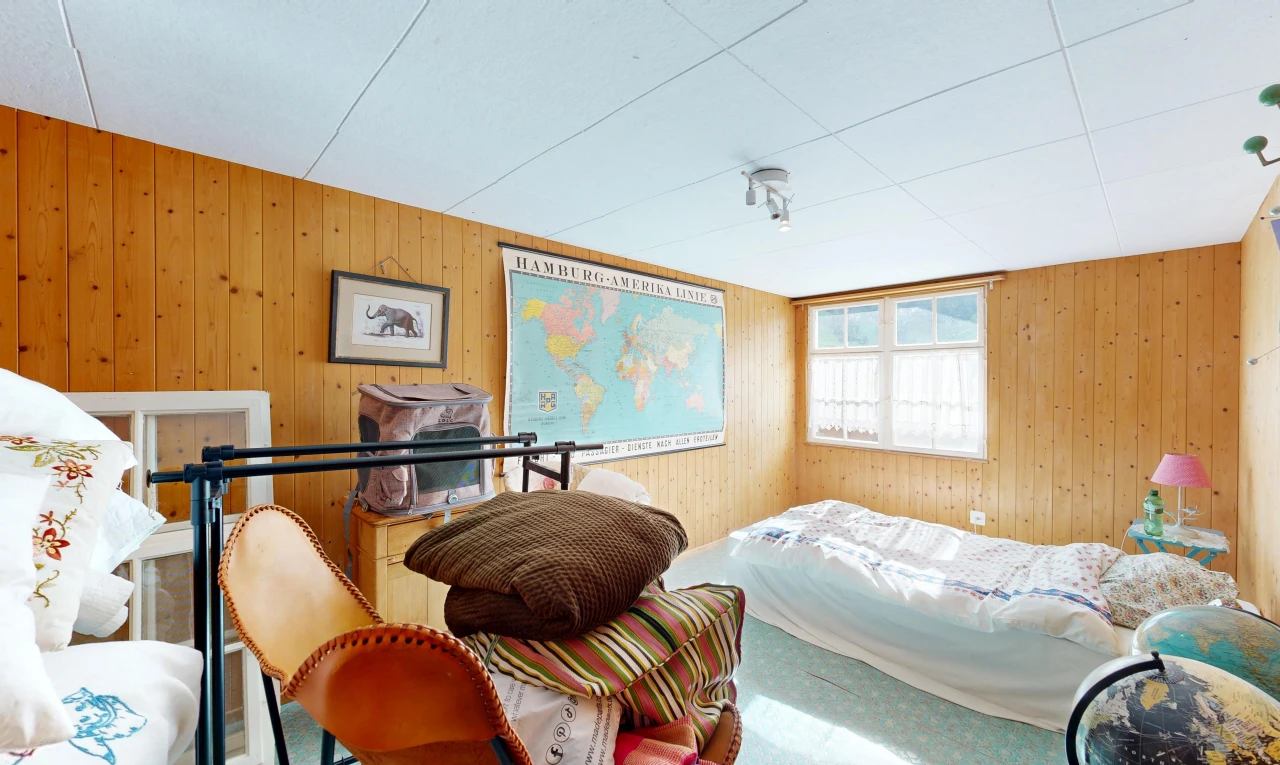 room / bedroom with wooden walls