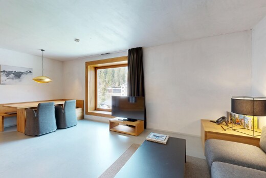 living room with finished concrete floors