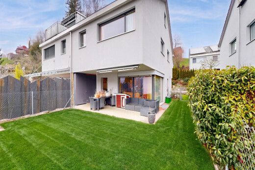 view of property featuring a fenced backyard, stucco siding, and a patio