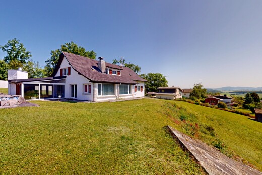 außenansicht mit schornstein, terrasse, rasen, day time, und property visible