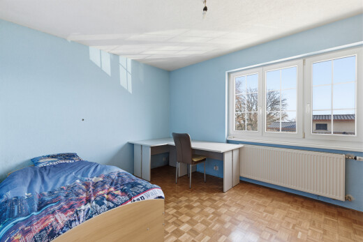 zimmer / schlafzimmer mit kühler, parquet floor, bürobereich, gipskartonwand, und drywall