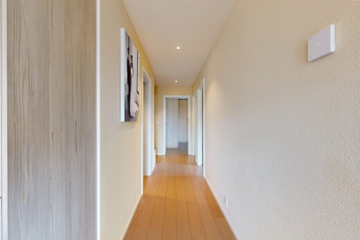 hallway featuring recessed lighting and light wood finished floors