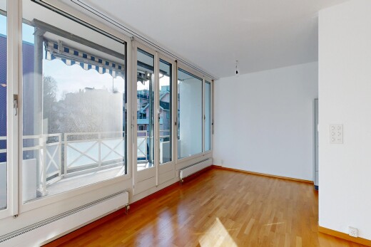 leerer raum mit fußleistenheizung, holzfußboden, wood finish floor, gipskartonwand, und drywall