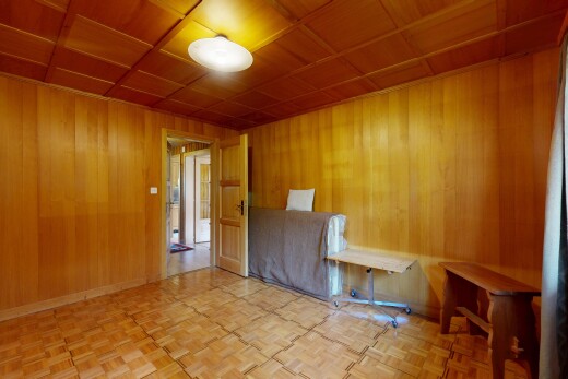 spare room featuring wood ceiling, wood walls, and parquet floors