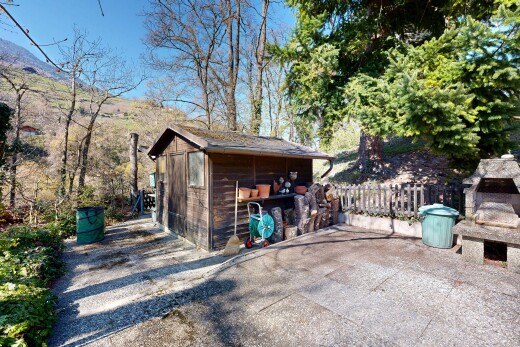 view of property with an outbuilding