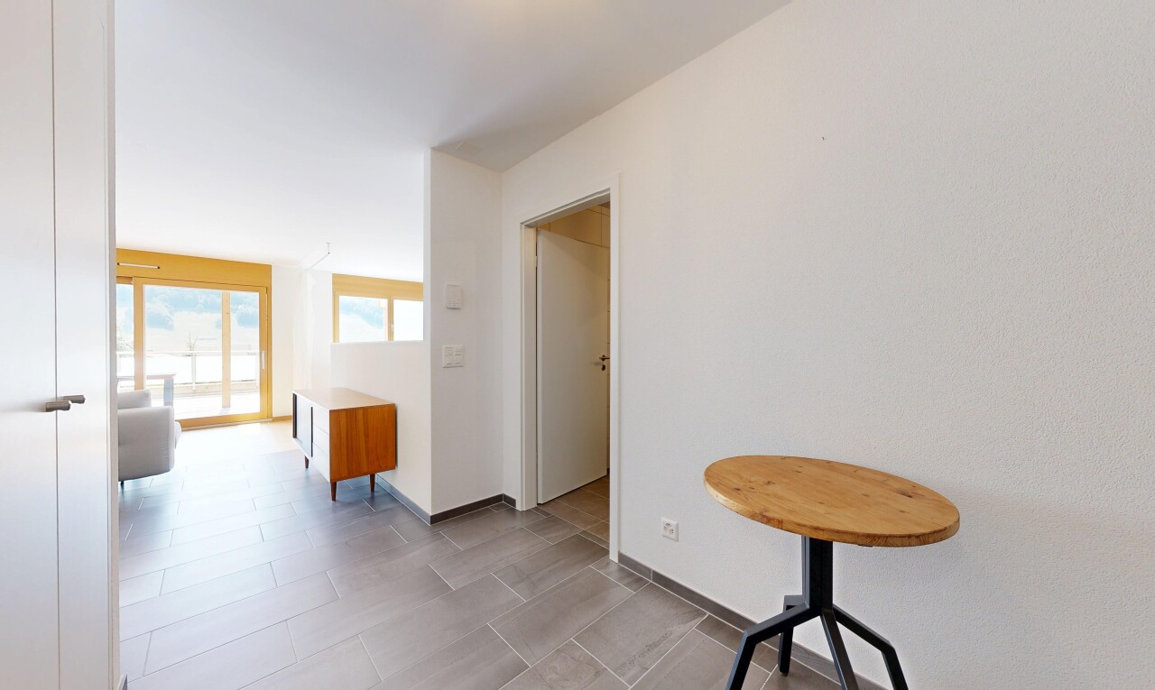 halle / korridor mit drywall, gipskartonwand, baseboards wall, sockelleisten, und inside property