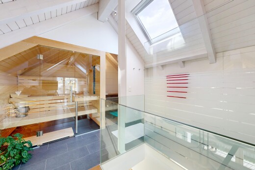 rezeption / lobby mit beamed ceiling, inside community, tile floor, vaulted ceiling, und dachfenster