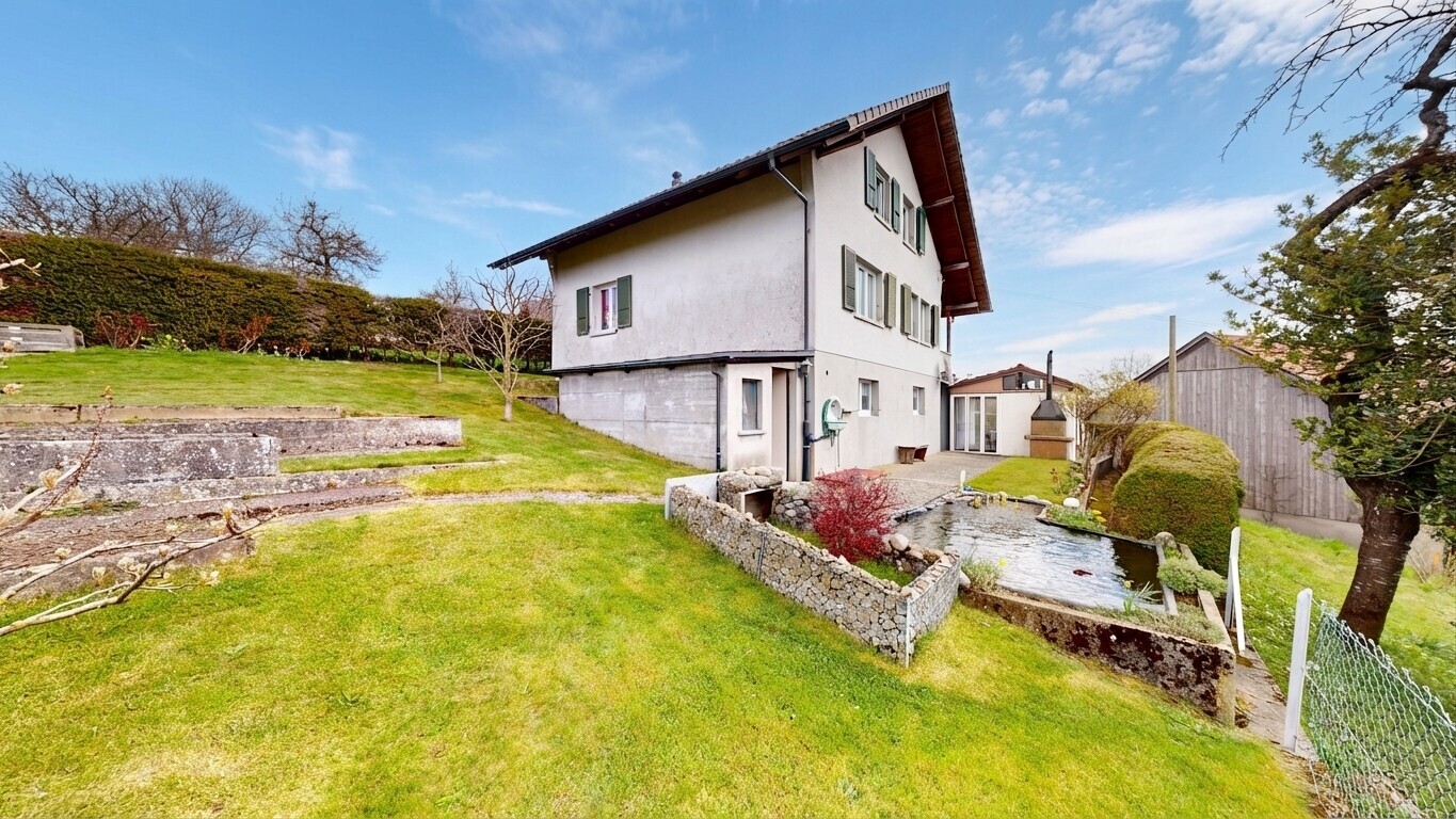 view of home with stucco siding