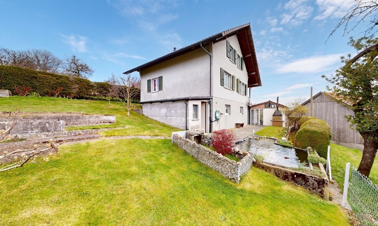view of home with stucco siding