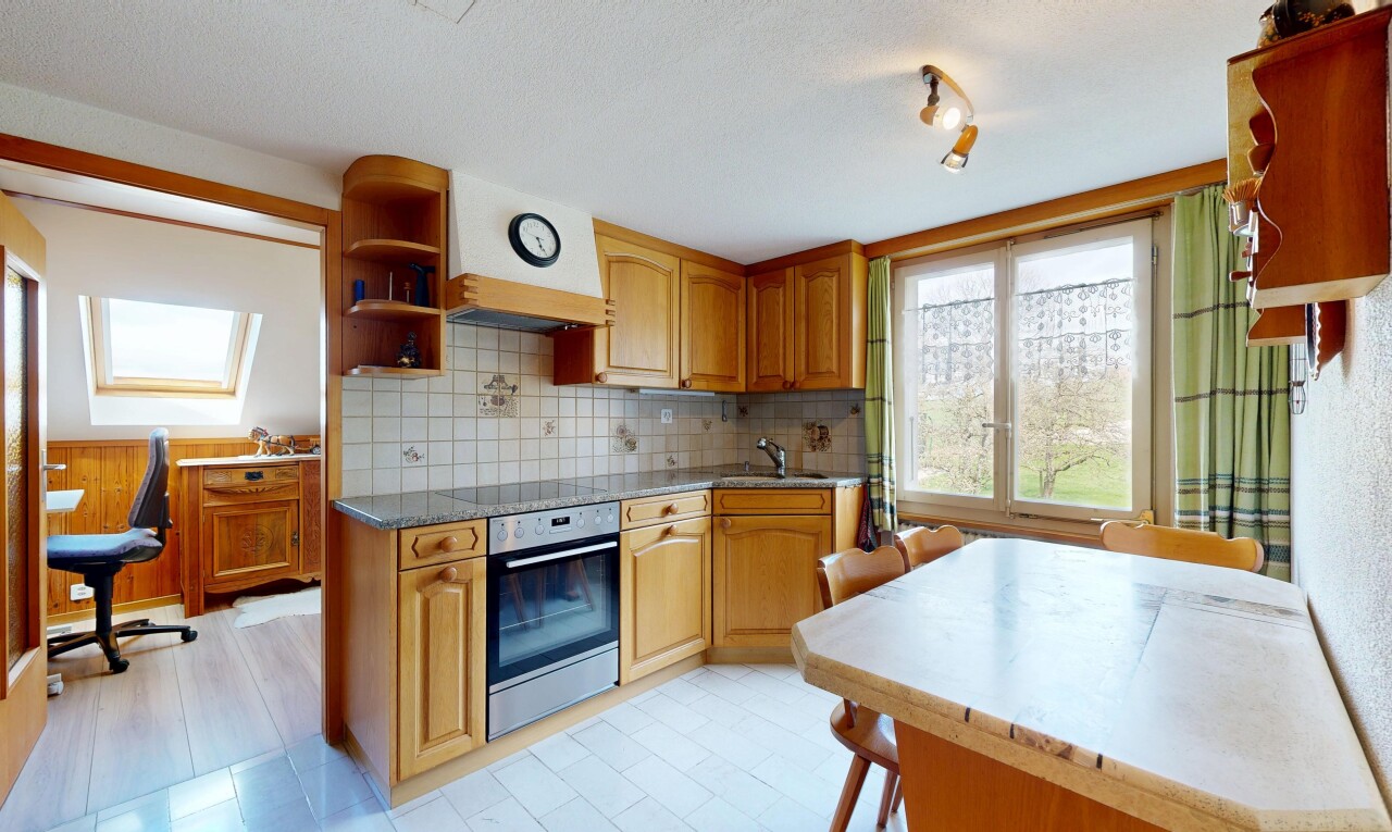 kitchen with open shelves, dark stone counters, stainless steel oven, wood finish cabinetry, and backsplash