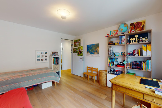 room with light wood-type flooring