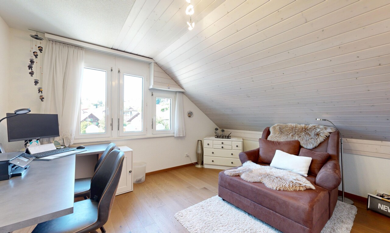 office space with light wood-style floors and a vaulted wood ceiling
