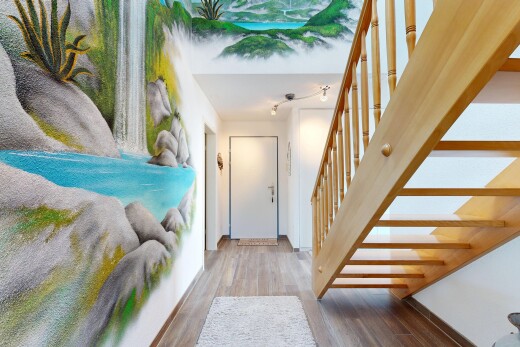 treppe mit treppen, wood finish floor, holzfußboden, drywall, und inside property