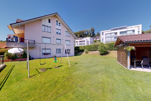 außenansicht mit rasen, day time, terrasse, und stuckverkleidung