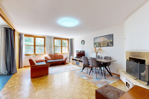 living / dining area featuring parquet floors