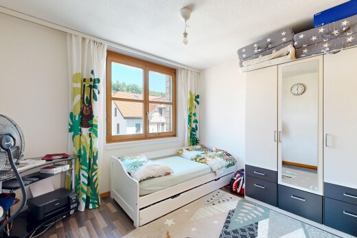 room / bedroom with dark wood-style flooring