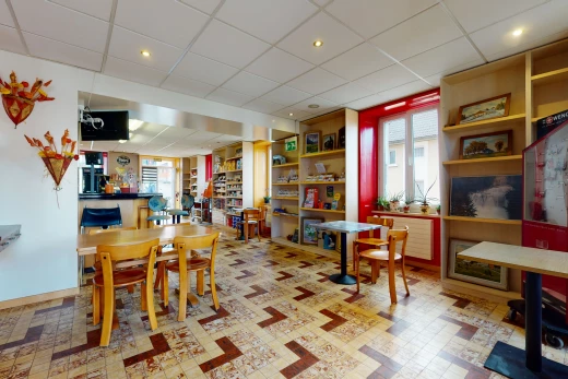 dining room with tile flooring, natural light, and TV