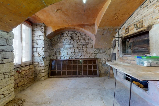 bathroom featuring a fireplace and vanity