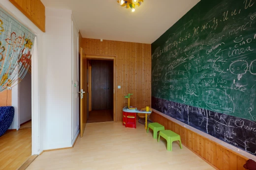 game room with hardwood flooring