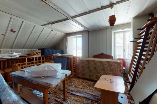 bedroom featuring lofted ceiling with beams and multiple windows