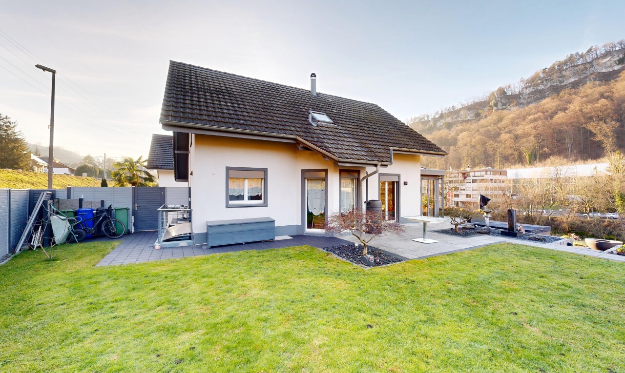 façade avec pelouse, from property, terrasse, et bardage en stuc