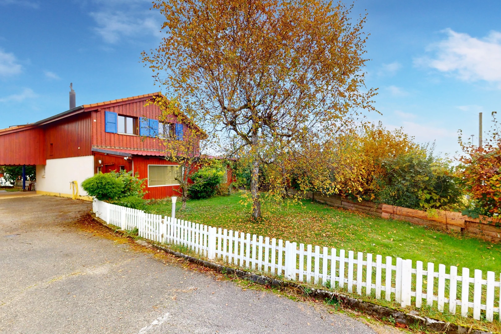 view of home featuring a lawn