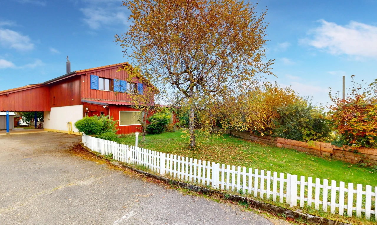view of home featuring a lawn