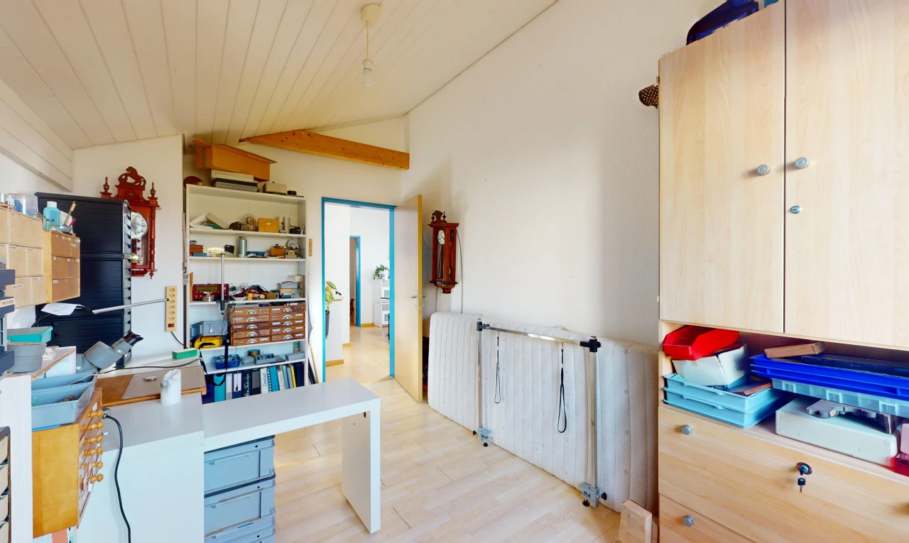 interior space with light hardwood / wood-style flooring, light brown cabinetry, vaulted ceiling, and wood ceiling