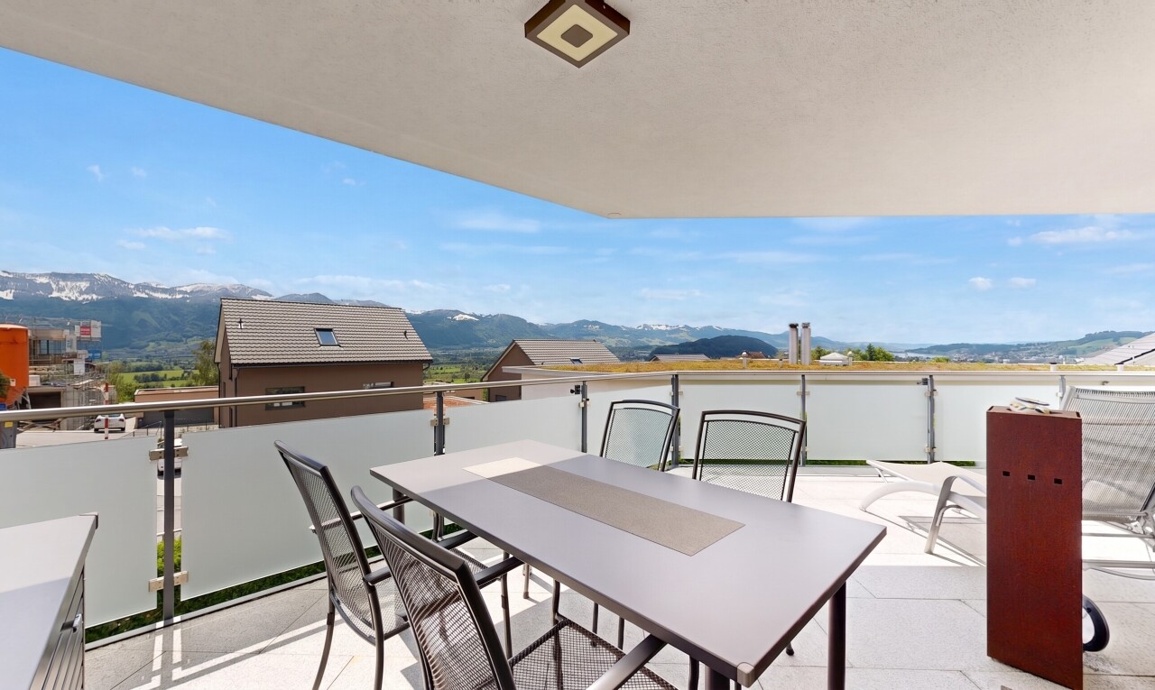 terrace featuring a patio, a mountain view, and outdoor dining area
