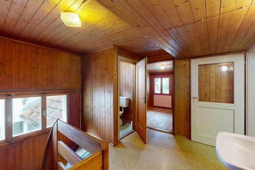 interior space with wooden ceiling, wood walls, and light floors