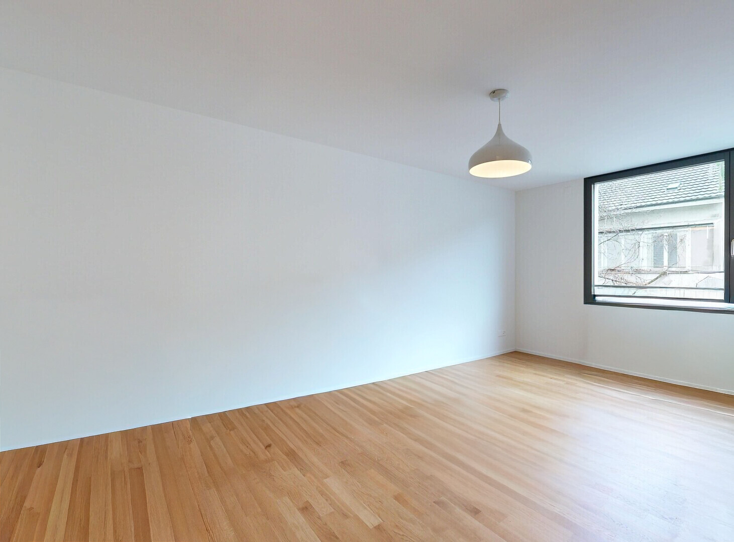 spare room with light wood-style floors