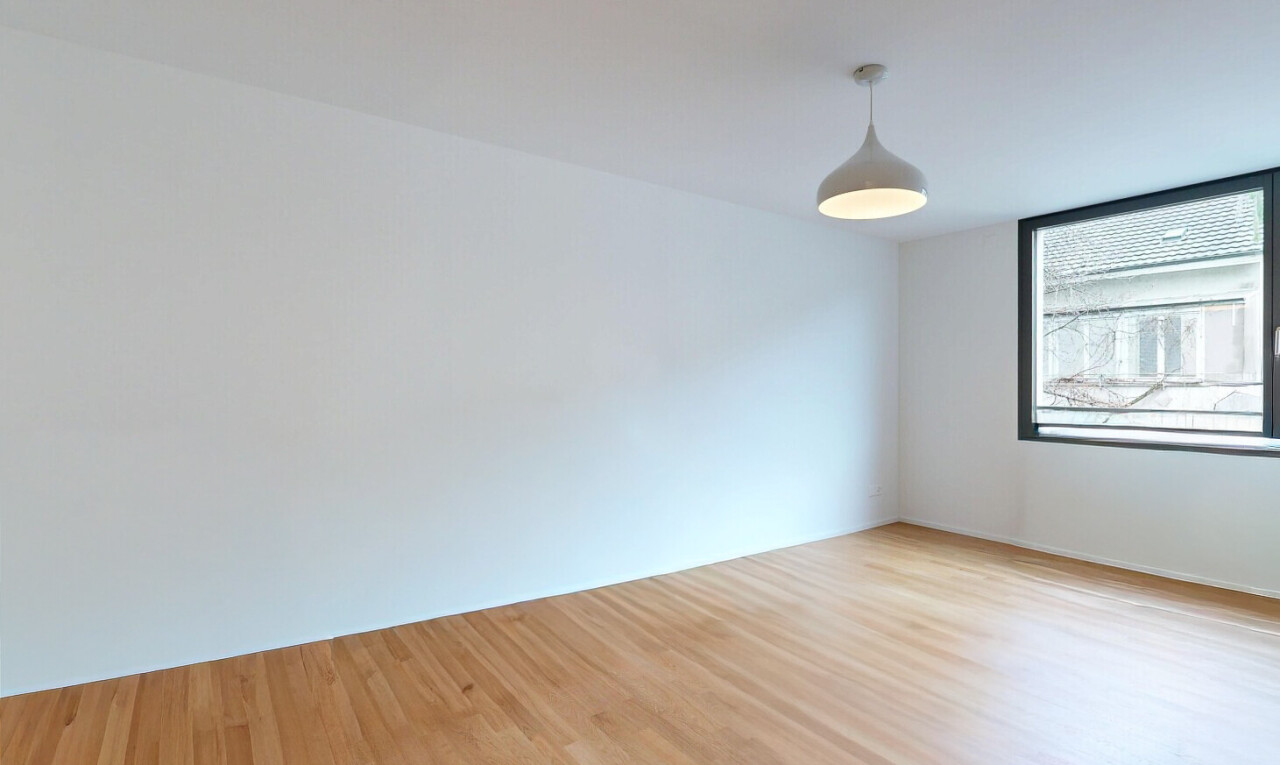 spare room with light wood-style floors