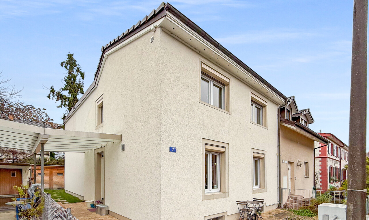 view of home with stucco siding and a patio area
