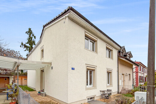 view of home with stucco siding and a patio area