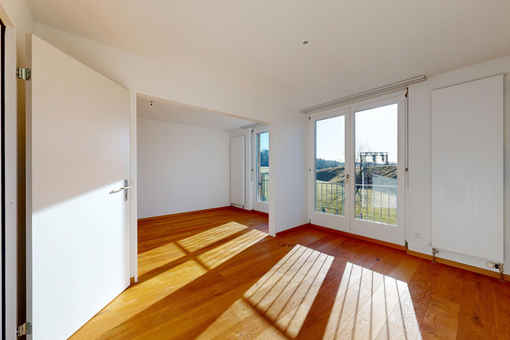 unfurnished room featuring light wood finished floors
