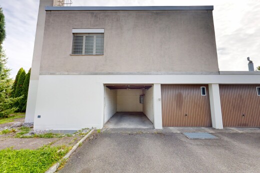 außenansicht mit stuckverkleidung, property visible, und overcast