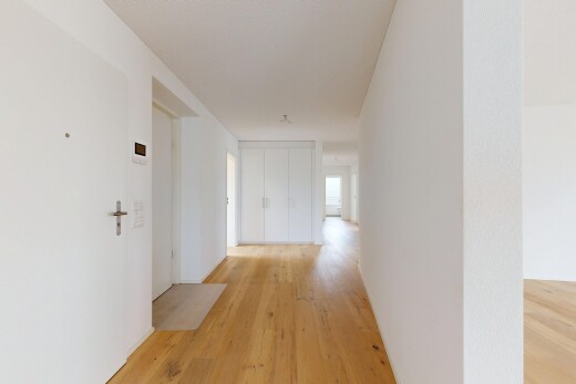 halle / korridor mit holzfußboden, wood finish floor, inside property, gipskartonwand, und drywall