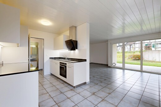 küche mit weiße schränke, tile floor, fliesenboden, inside property, und natural light