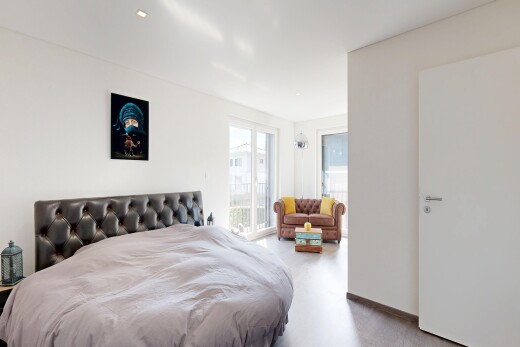 room with light carpet and access to exterior