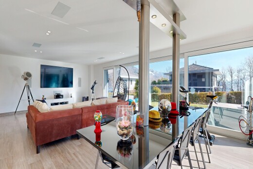 living / dining room with light wood finished floors and recessed lighting