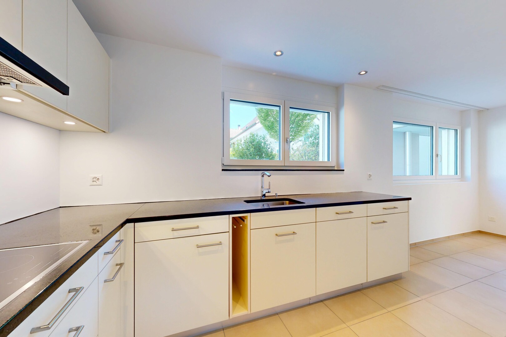 küche mit white cabinets, weiße schränke, dark countertops, arbeitsplatten, und light floor